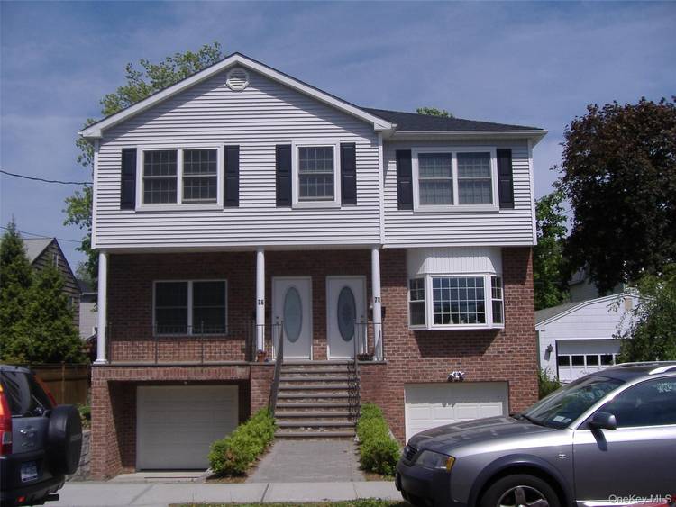 Beautiful Duplex Apt with EIK that has granite countertops and stainless steel appliances.