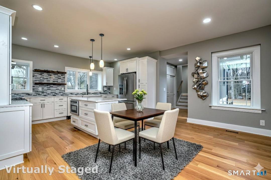 Set on nearly one acre in sought after Orange, this fully remodeled split level ranch delivers peace of mind with all new windows, a new roof, and brand new flooring ...