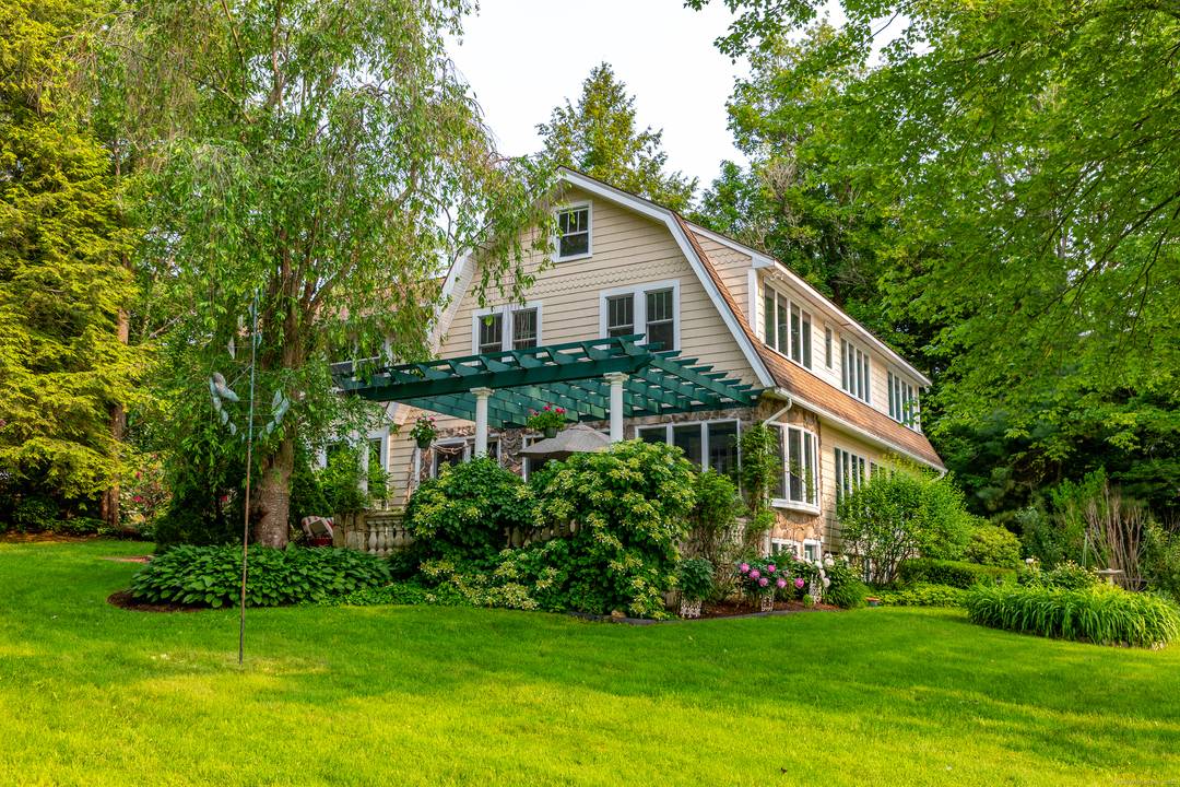 Set on one of Deer Island's most gracious waterfront parcels, this 1920s lake house offers approximately 3, 500 square feet of living space across five bedrooms and approximately 142 feet ...