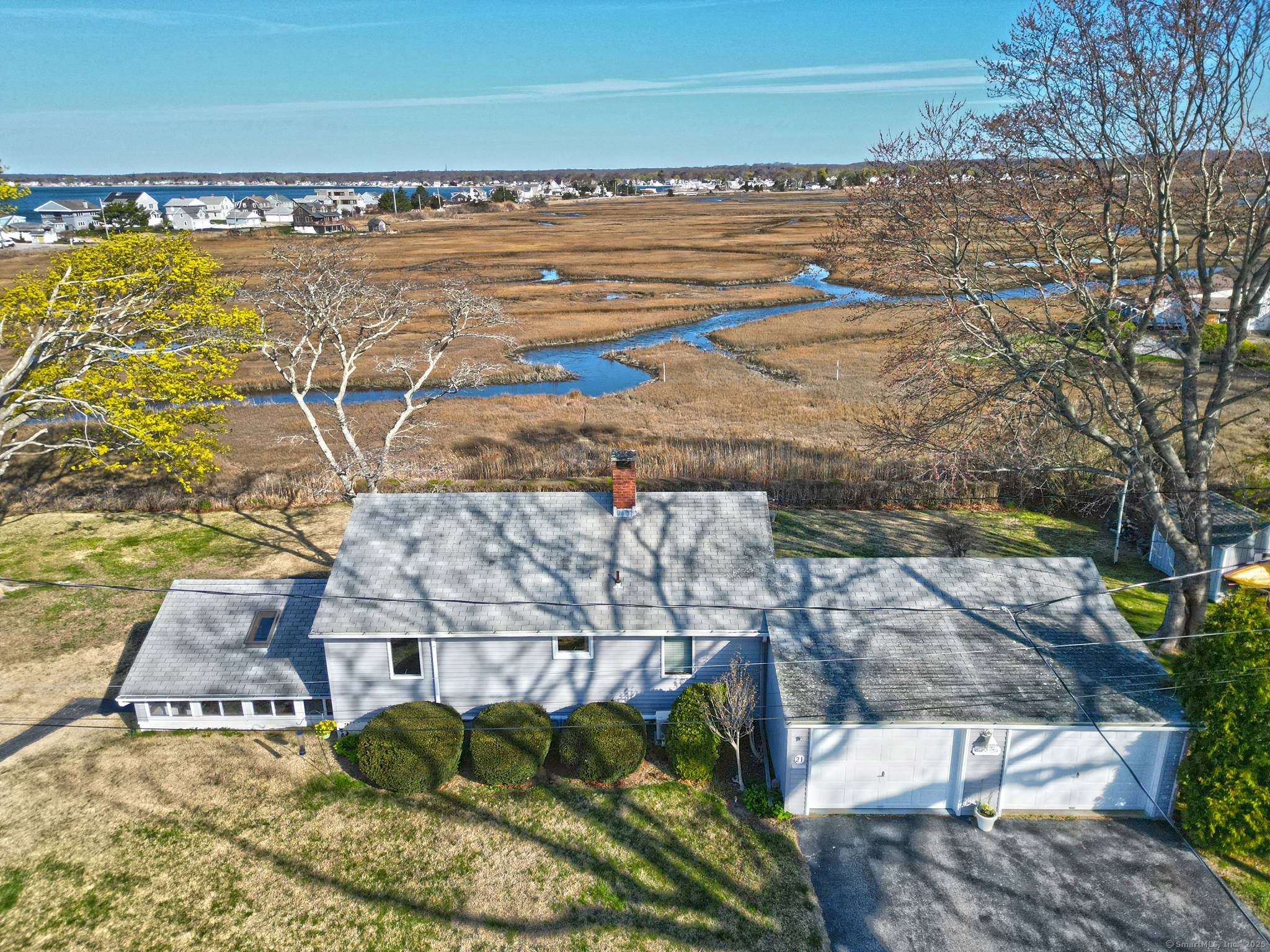 Imagine waking up to breathtaking marsh views and stunning sunsets from your very own slice of paradise in the highly desirable Cornfield Point waterfront community.
