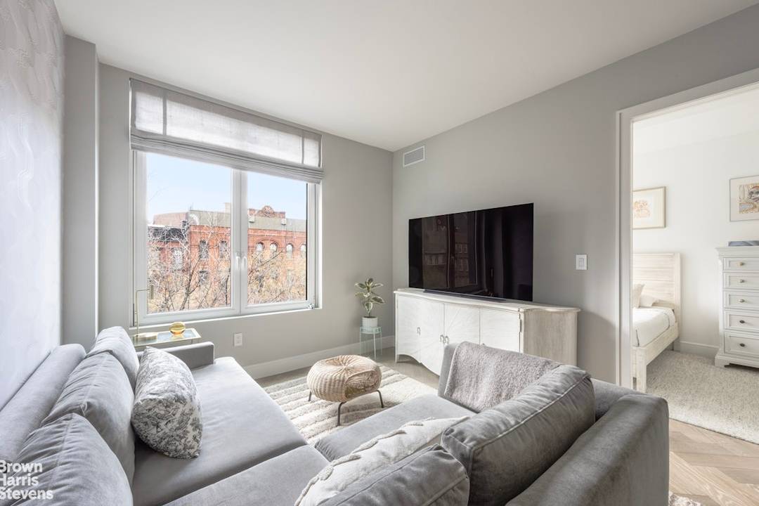 A 1 BR Den at 101 East 2nd Residence 5D is a sophisticated one bedroom with a separate home office den, and one and a half bathrooms.