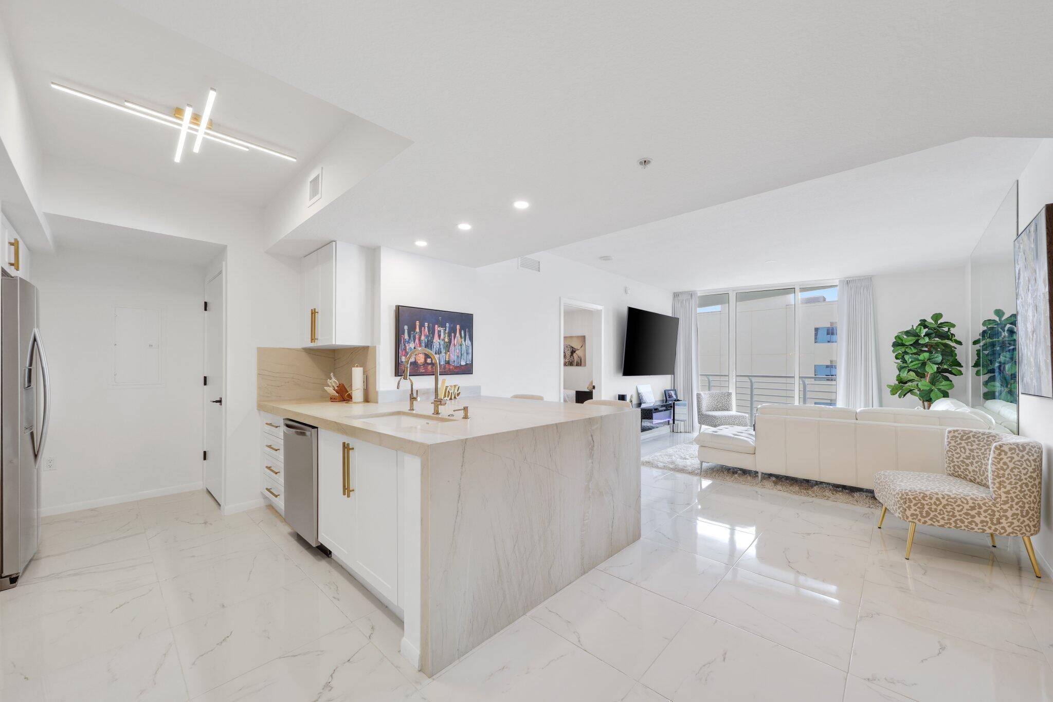 Experience luxury living in this beautifully updated 2 bed, 2 bath condo located in the heart of downtown West Palm Beach.