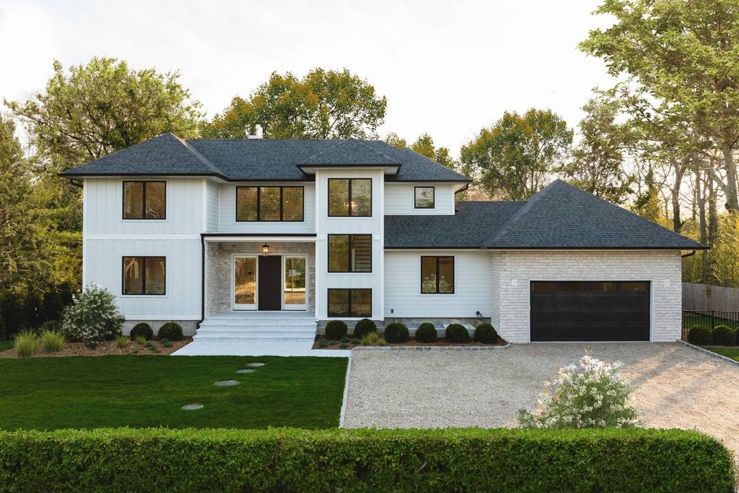 Set on 0. 4 acres this 4, 932 SF residence offers 7 bedrooms, 6 full and 1 half bathrooms, and an attached 2 car garage.