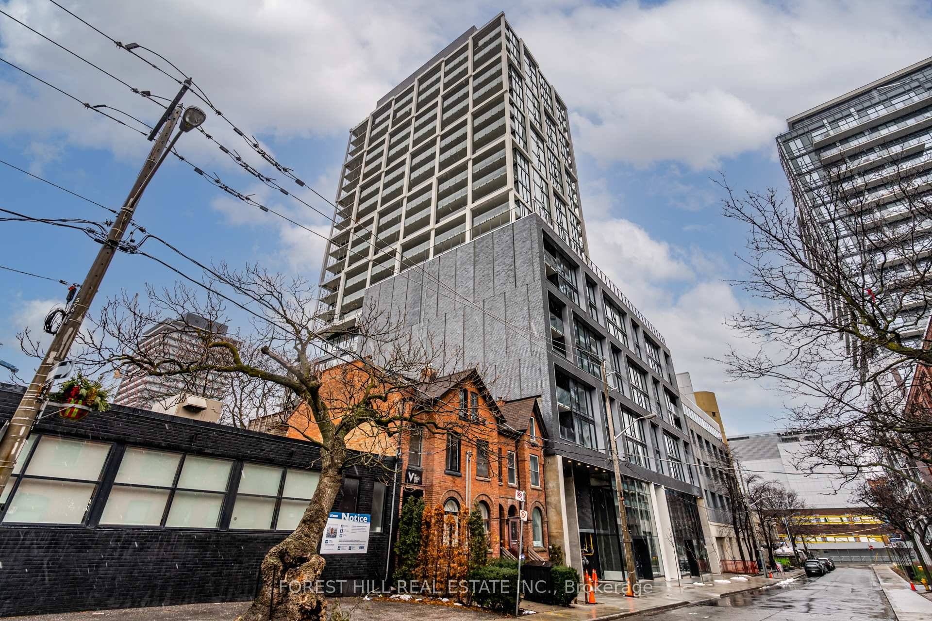 1 den at East 55 with a large balcony.