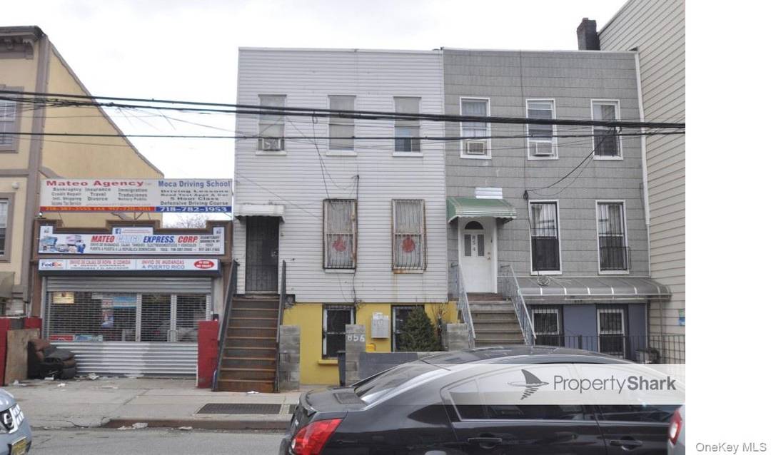 Development Sale 2 story 2 family with storefront, and the next door lot was demolished due to NYC requirements.