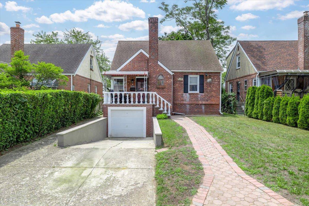 Newly renovated detached single family home with private driveway and garage in the heart of Queens Village !
