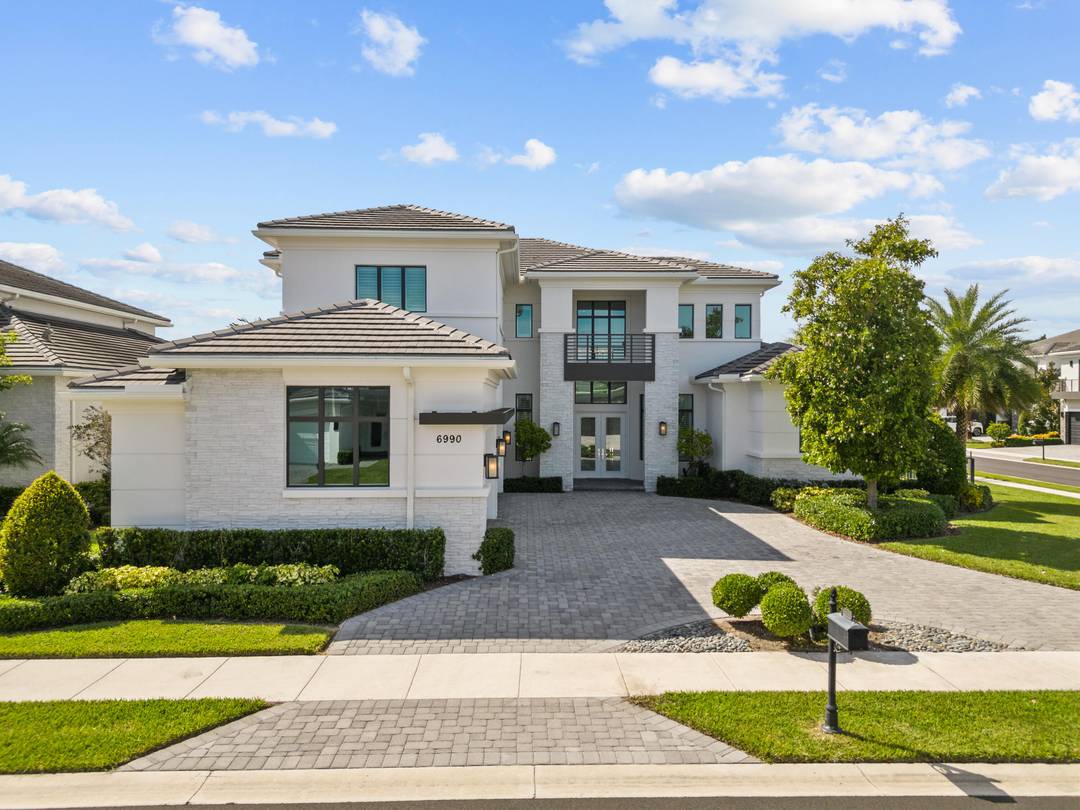 ULTIMATE LUXURY ON A PREMIER OVERSIZED LOT.