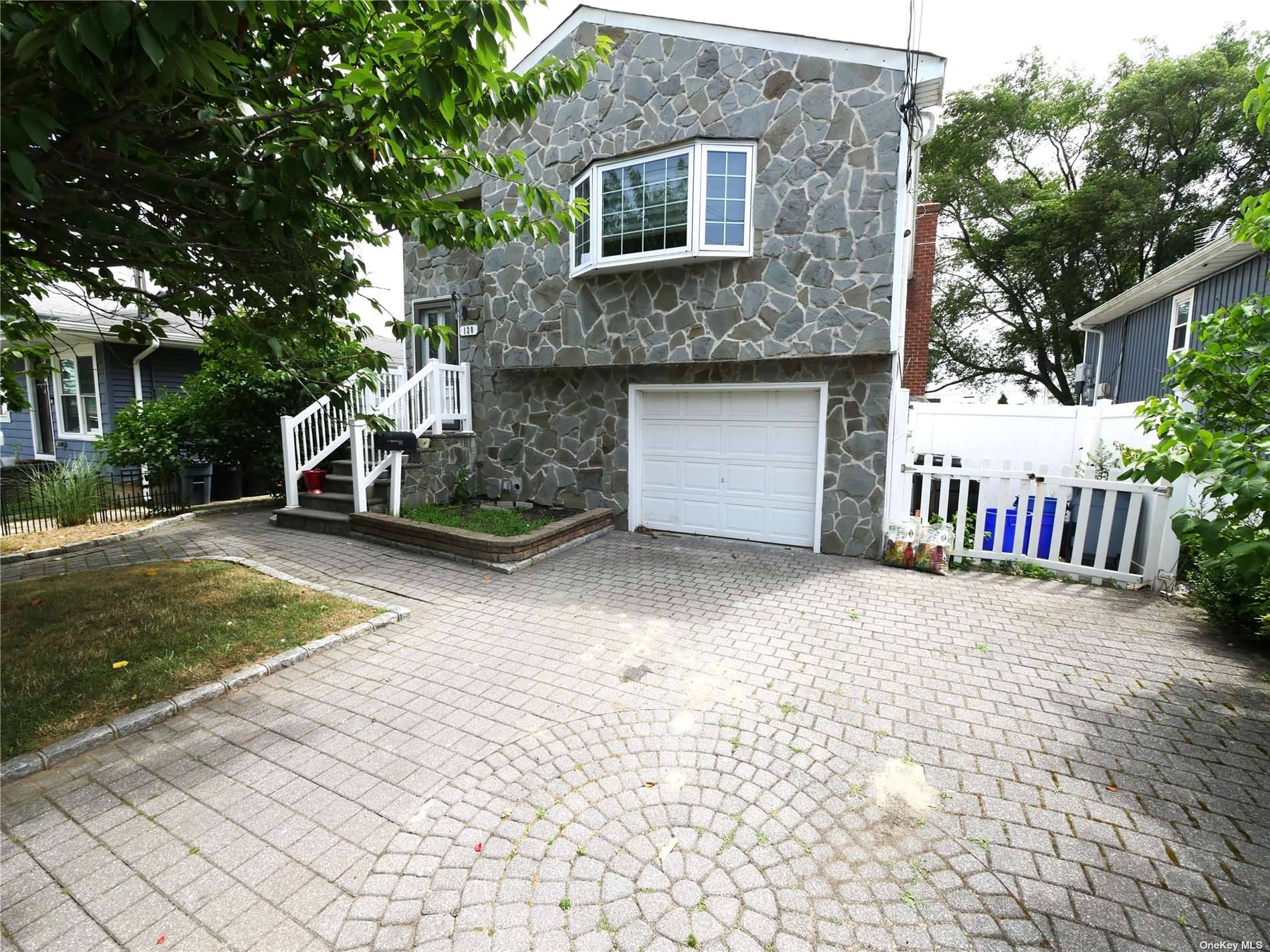 Discover this spacious 5 bedroom, 2 bath Hi Ranch home boasting a coveted open floor plan.