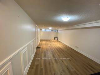Updated Bright Unit, Close To High Ranked Bayview Secondary And Shopping centre, 2 Parking Spots and separate laundry