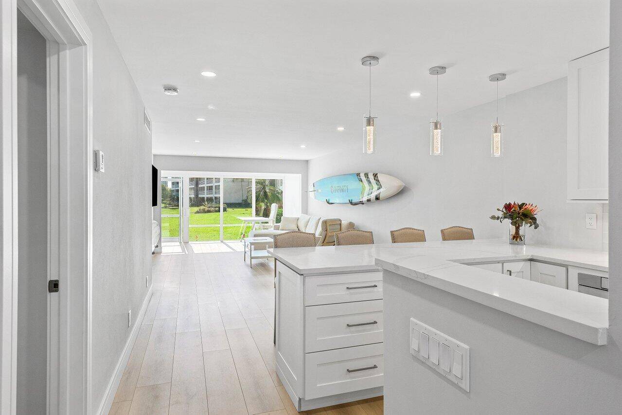 Absolutely stunning updated retreat in the hidden gem of Tropic Harbor, an active 55 waterfront community just 2.