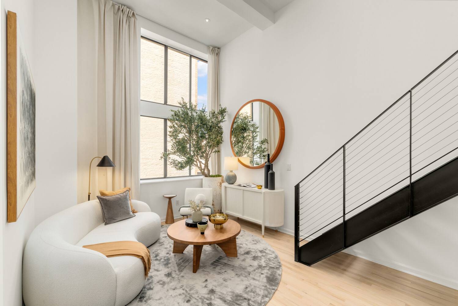 Welcome to this stunning duplex loft in the iconic Printing House, a full service luxury condominium in the coveted West Village.