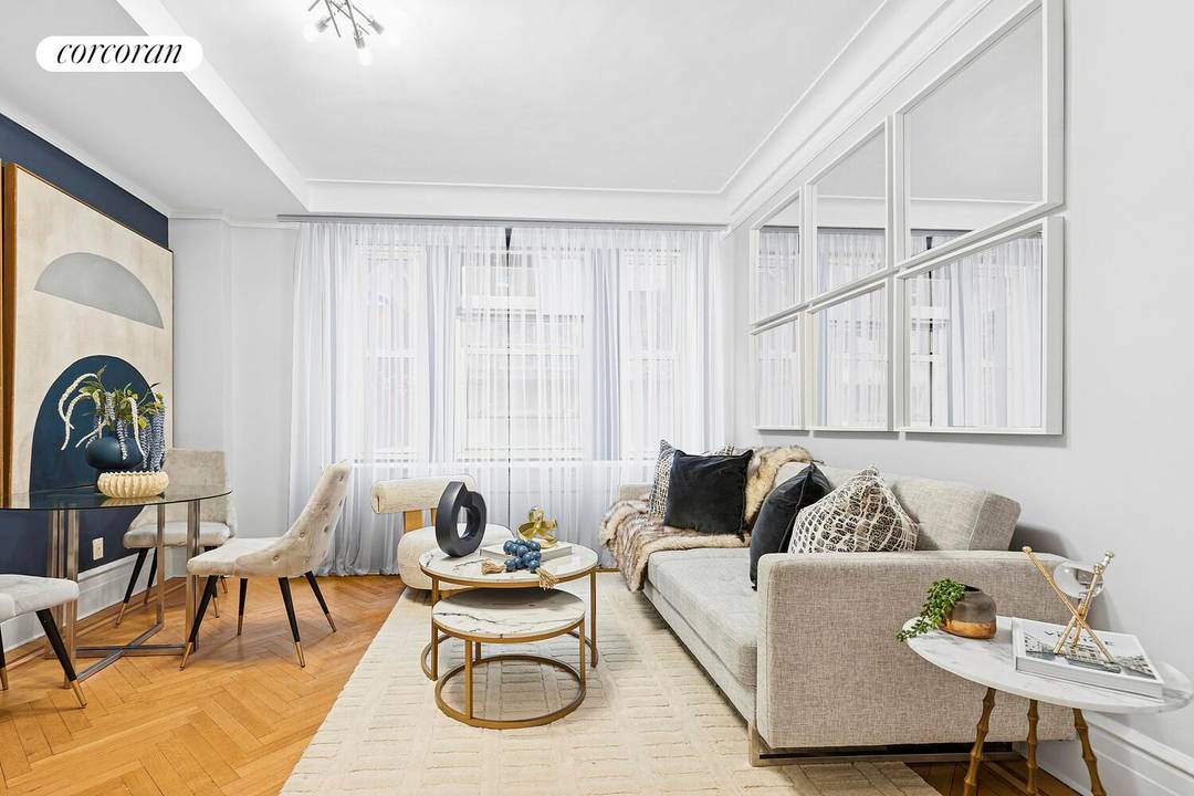 Welcome to Residence 1RE at 103 East 75th Street a rare and refined two bedroom, one and a half bath home tucked quietly off the lobby of one of the ...