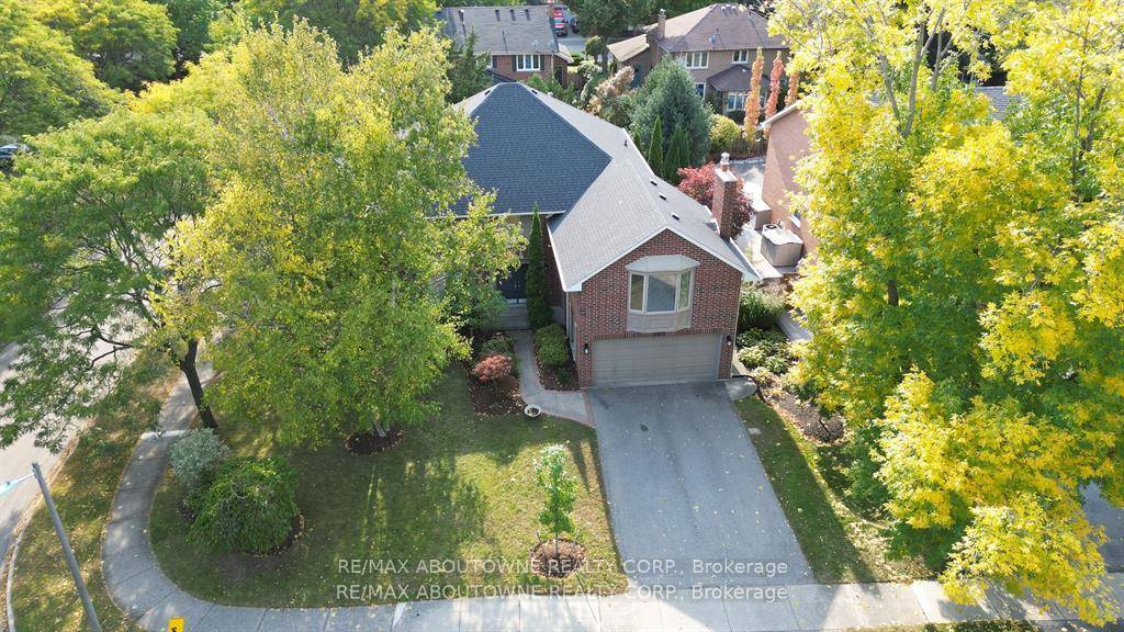 Great opportunity to own family home on a quiet tree lined crescent in prestigious South East Oakville !