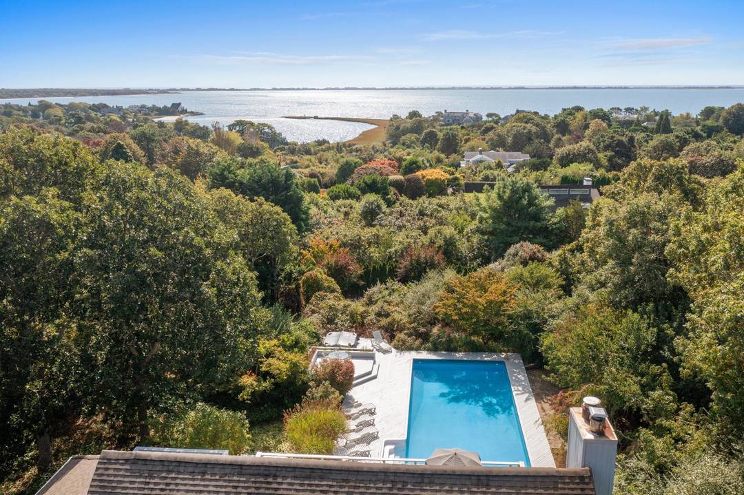 Discover a hidden gem with breathtaking water views in the exclusive Sandringham Beach community of Southampton !