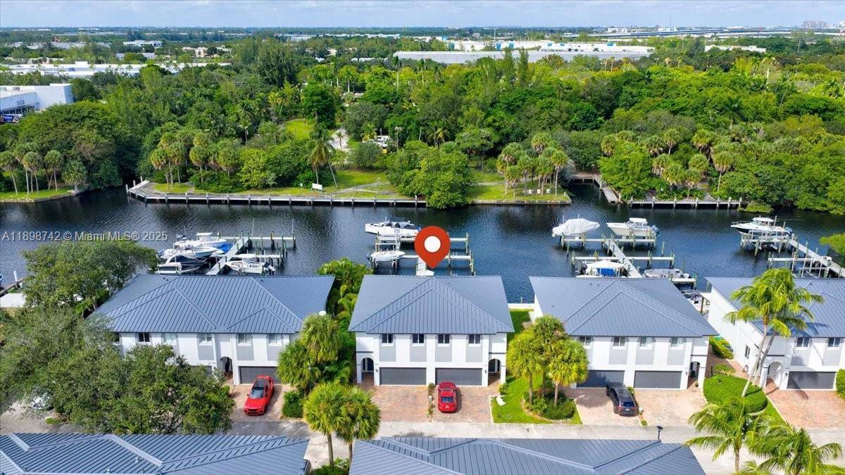 Boater's paradise ! 2017 build with Brand New Metal Roof and 20, 000 lb boat lift.