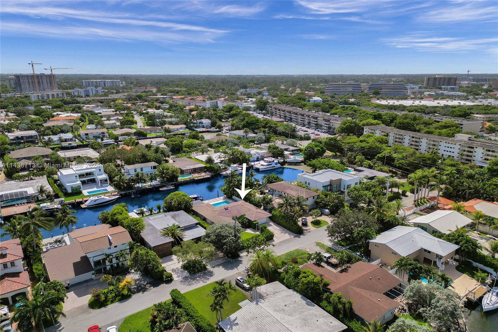 Be ready to fall in love with this beautifully remodeled waterfront home located in the exclusive gated community of Sans Souci Estates.