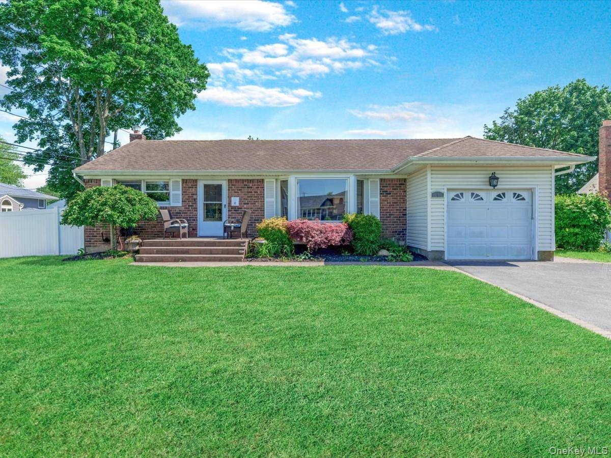 This beautiful brick and frame ranch style home is situated on a meticulously manicured 1 4 acre property with a resort inspired rear yard featuring a luxurious in ground swimming ...