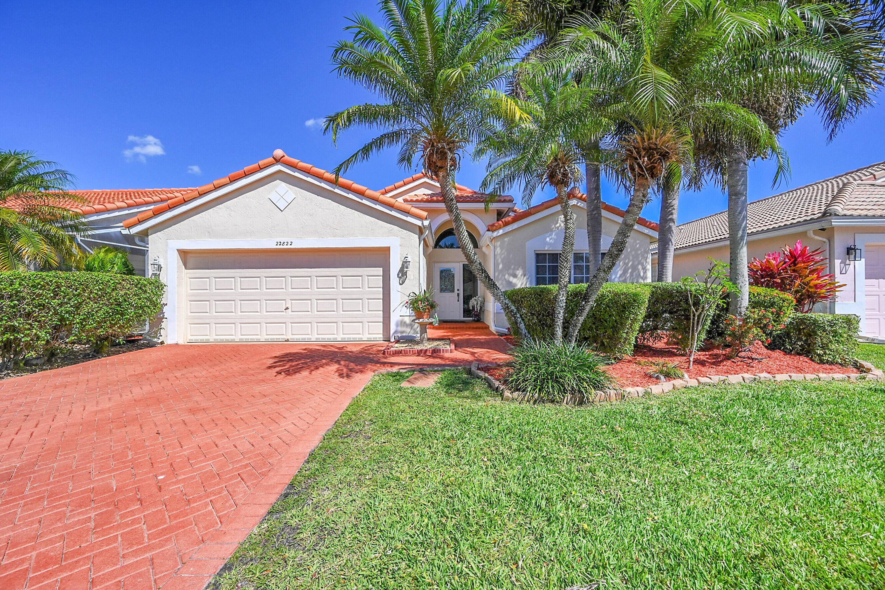 Don't miss the opportunity to own a former model in the gated community of Crescent Lakes.