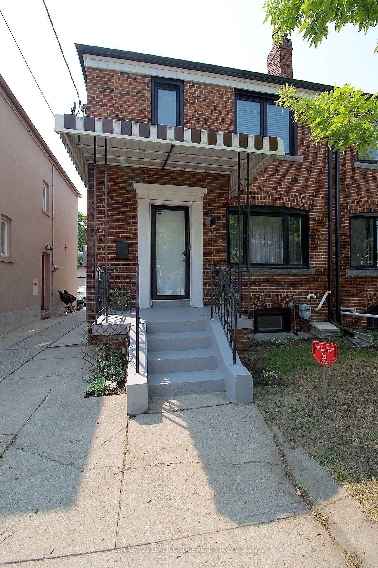 Furnished 2 Bedroom 1 Den Laundry Bedroom Upper Unit with Parking in Prime East York !