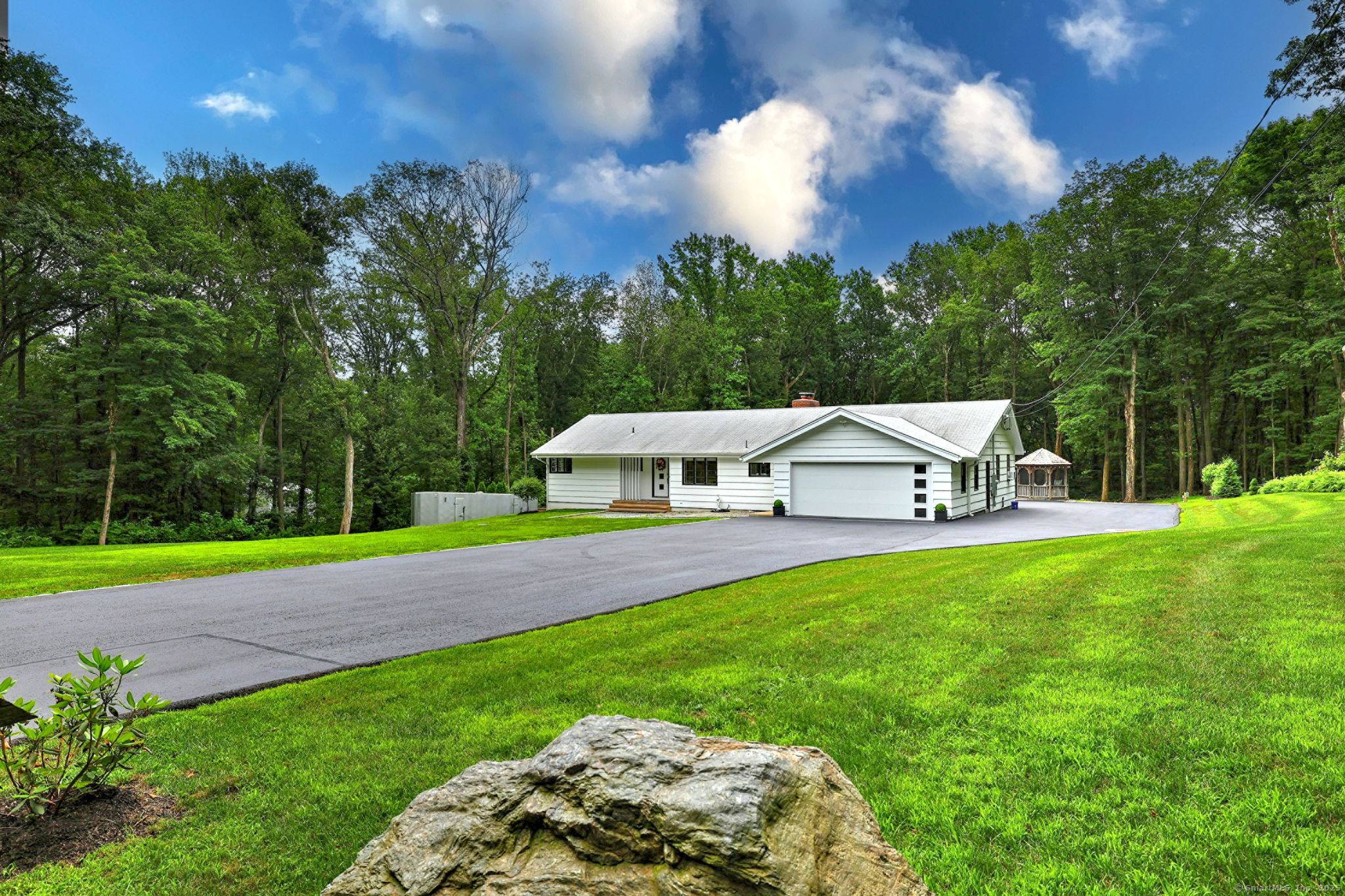 Spacious 5 Bedroom, 4 Bathroom Home with Modern Upgrades and Expansive Outdoor Spaces.