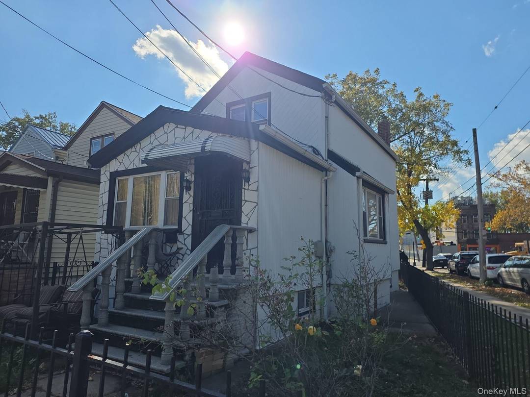 2 Bedroom colonial on a corner parcel having a full basement and great potential.