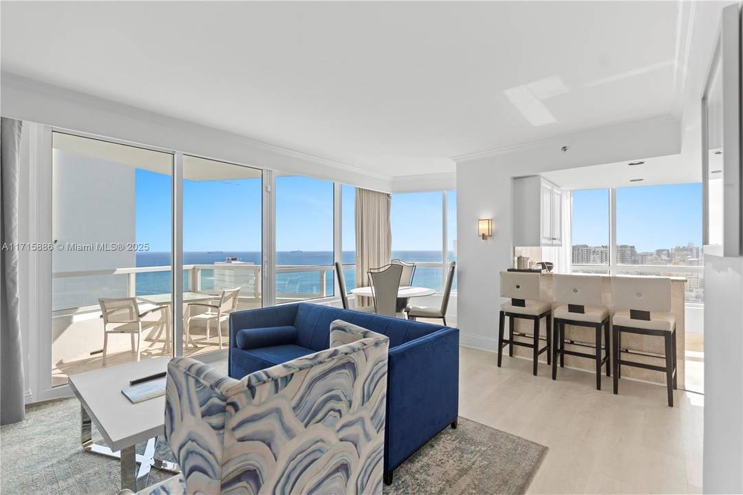Stunning southeast corner 1 bedroom, 2 bathroom residence at Fontainebleau II, featuring beautiful ocean and city views.