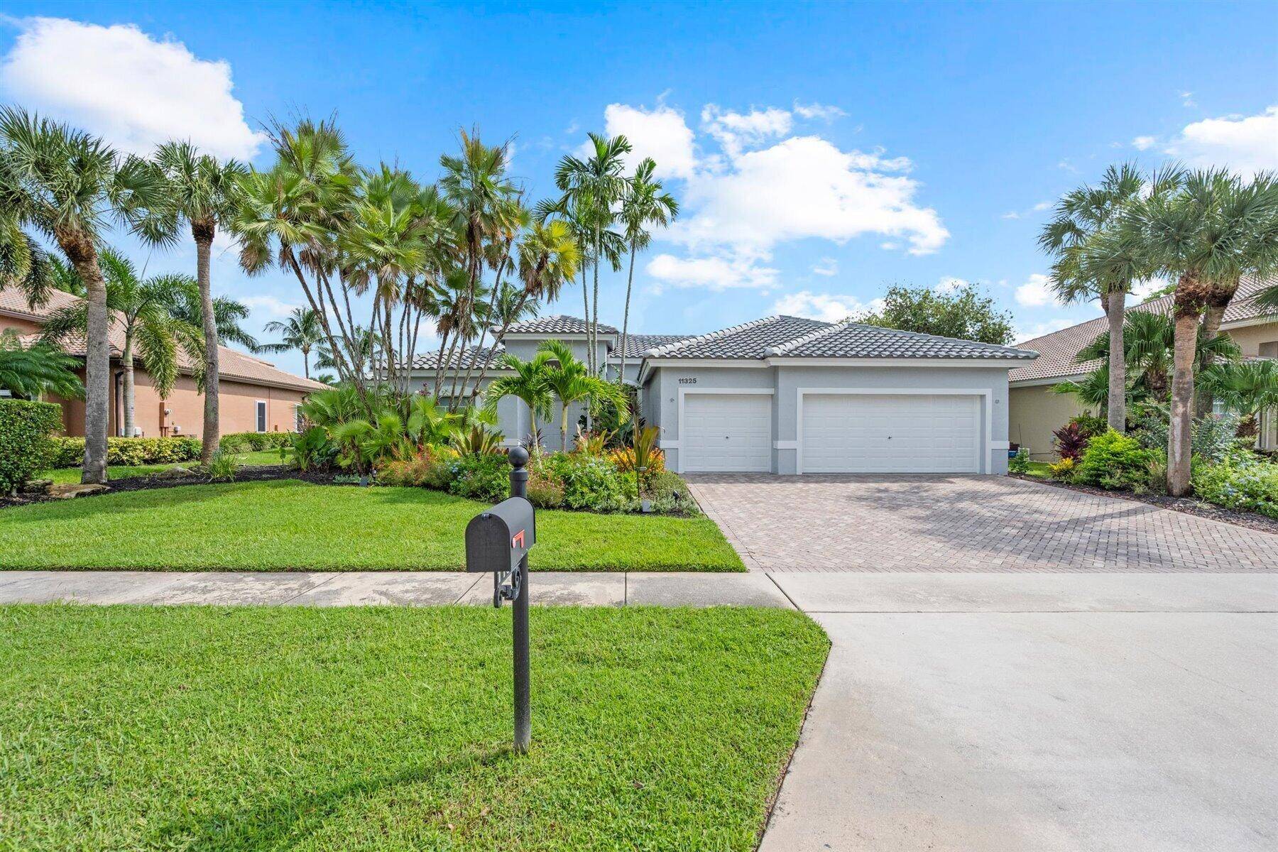 Welcome to this stunning, completely renovated oasis in the heart of Wellington, Florida.