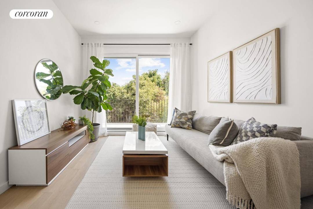 Welcome to Residence 4R at 48 Stanhope Street a sun filled 961 square foot, 2 bedroom, 2 bath duplex with soaring ceilings and private outdoor space in the heart of ...