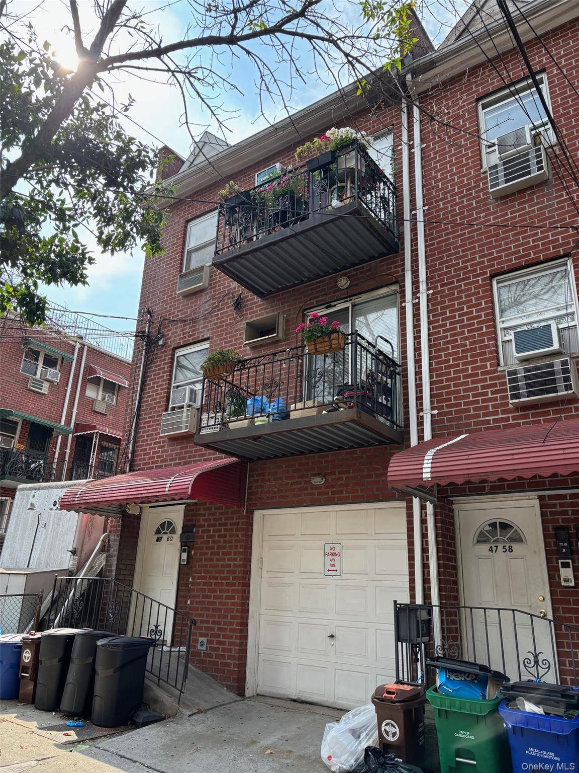 A 3 family brick triplex built in 1998 features approximately 2, 600 sft of living space situated on a corner lot.
