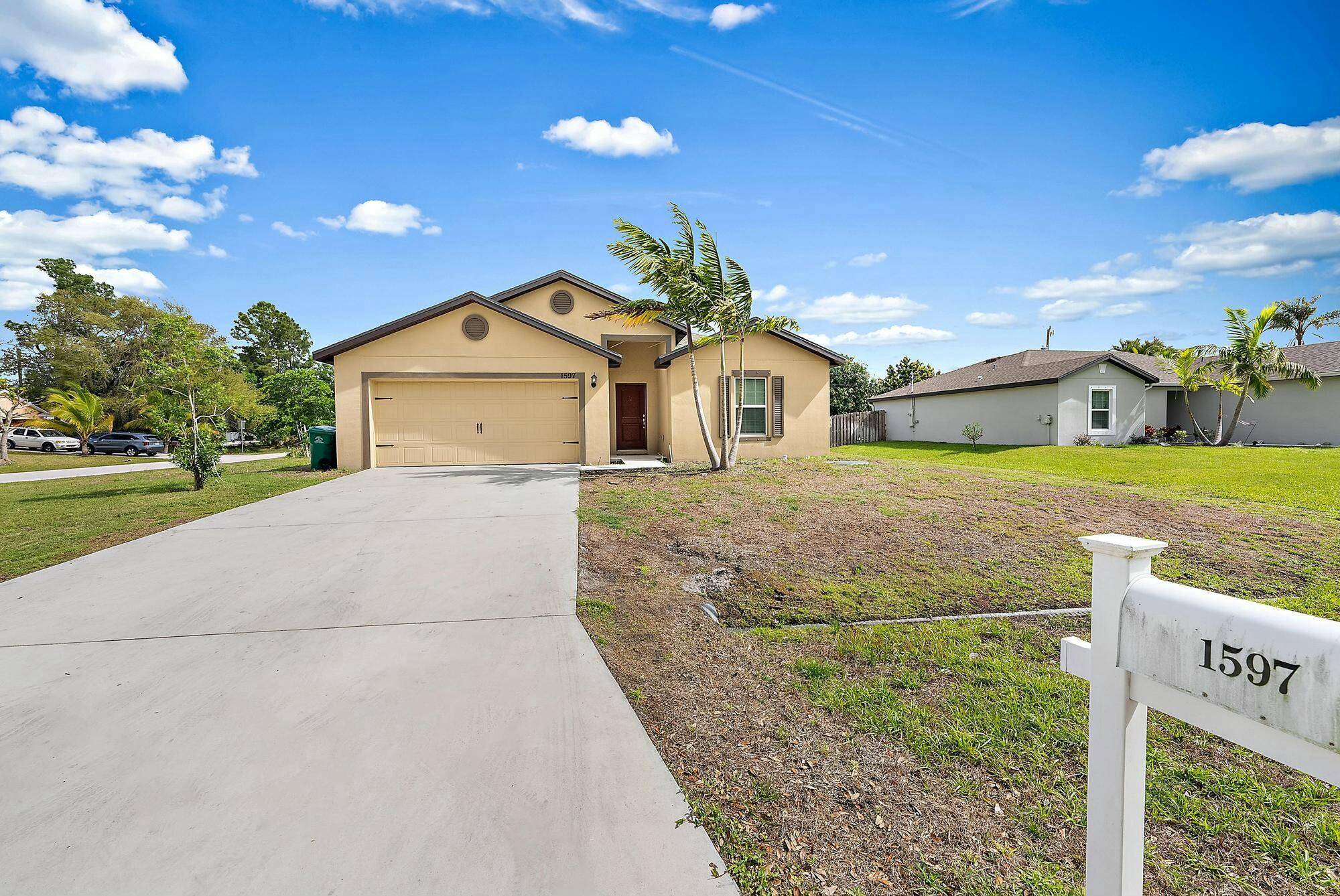 Newly Constructed 5 Bedroom Home on a Huge Corner Lot !