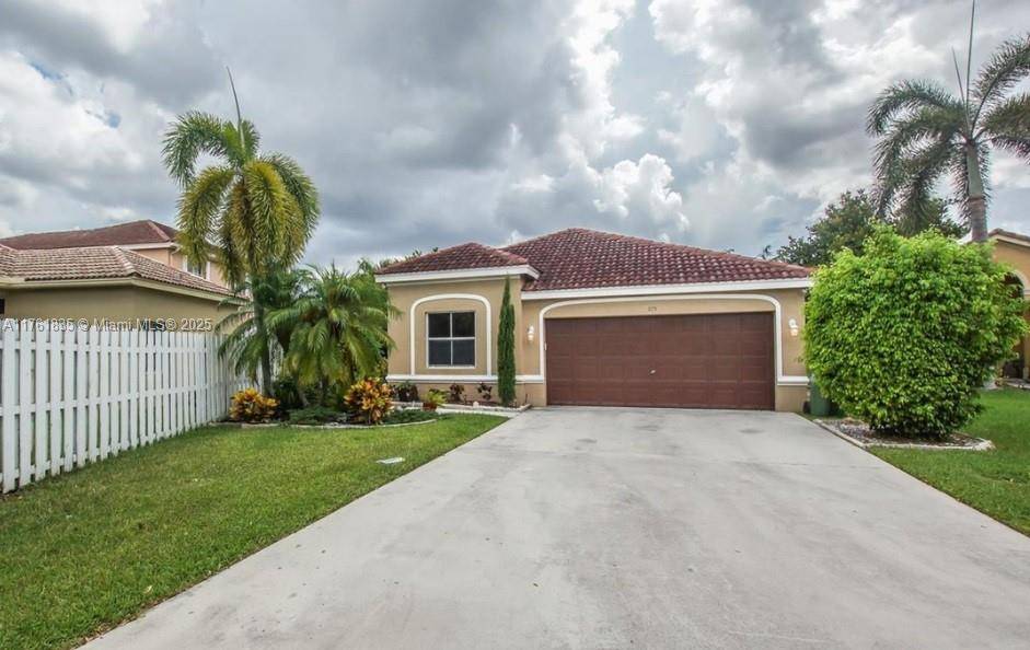Beautiful one story house with 4 beds and 2 bath in a 24 hour guard gated community, huge backyard for family entertainment.