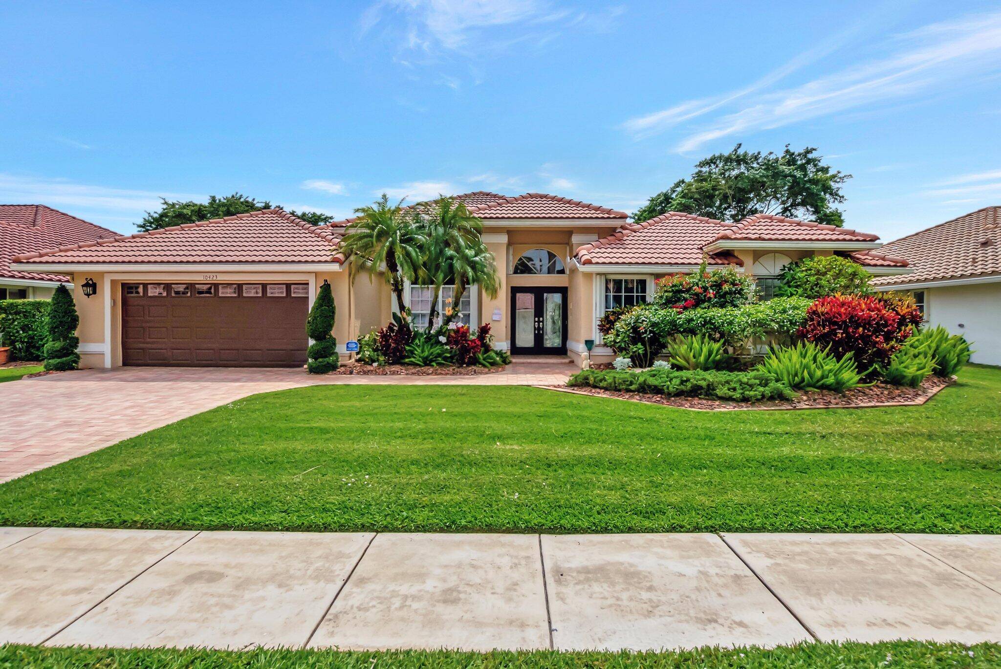 Rare grand cayman 4 model on excellent golf and water lot with southern exposure.