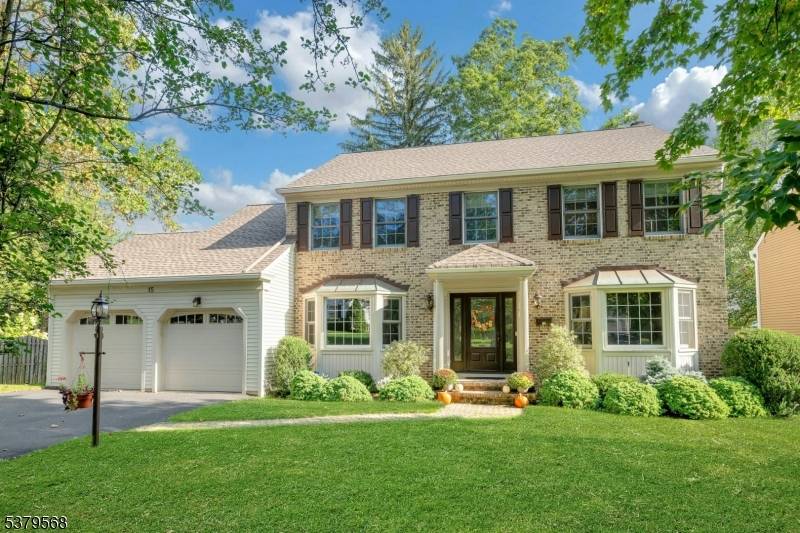 Welcome to this stunning center hall colonial in the heart of Chatham !