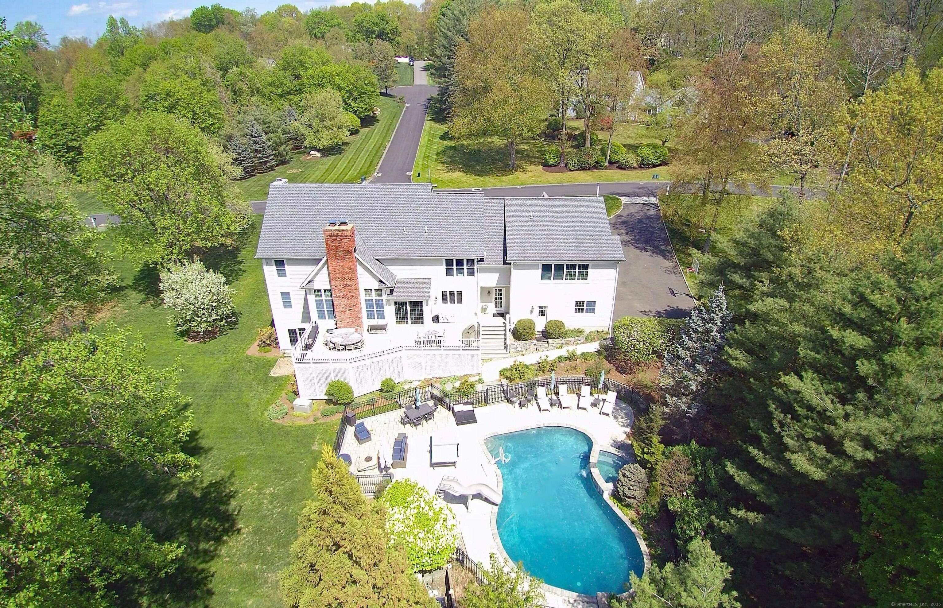 This exceptional home truly has it all sought after Farmingville location in Overlook Groves neighborhood, top of the line comprehensive renovation, resort setting w gunite, heated, saltwater pool, stone waterfall ...