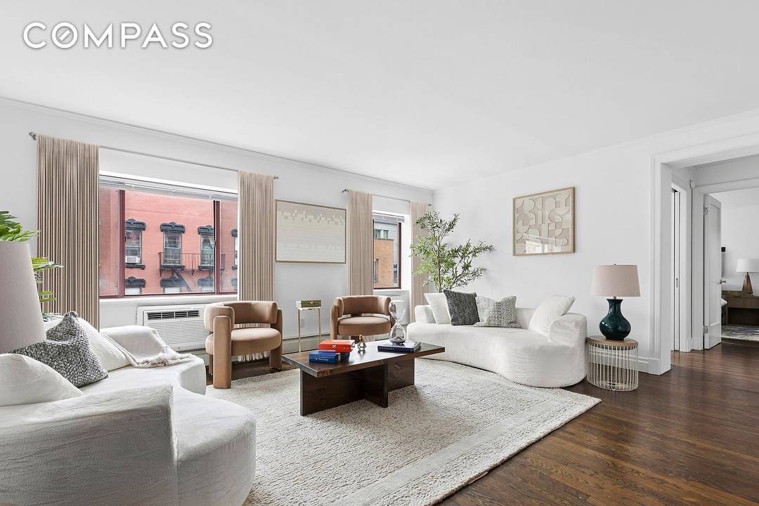 Sun filled 2 bedroom, 2 bathroom residence in the heart of the East Village.
