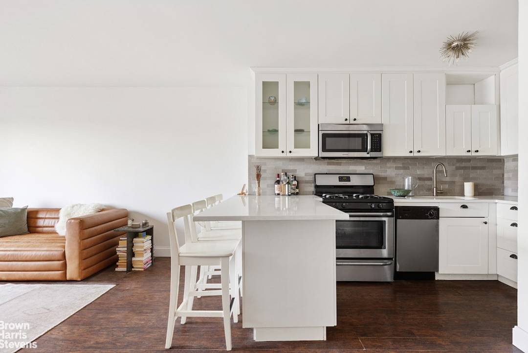 Bright and airy apartment 710 at 185 Hall Street is a thoughtfully updated one bedroom, one bathroom cooperative with open city views and exceptional storage throughout.