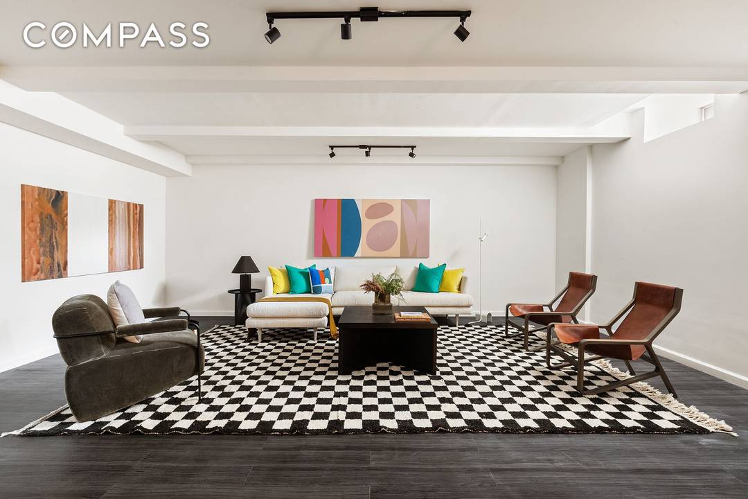 INCREDIBLE SPACE AND VALUE This oversized duplex two bedroom CONDOMINIUM offers an enormous 1, 973 square feet of total living space at just over 700 per square foot !