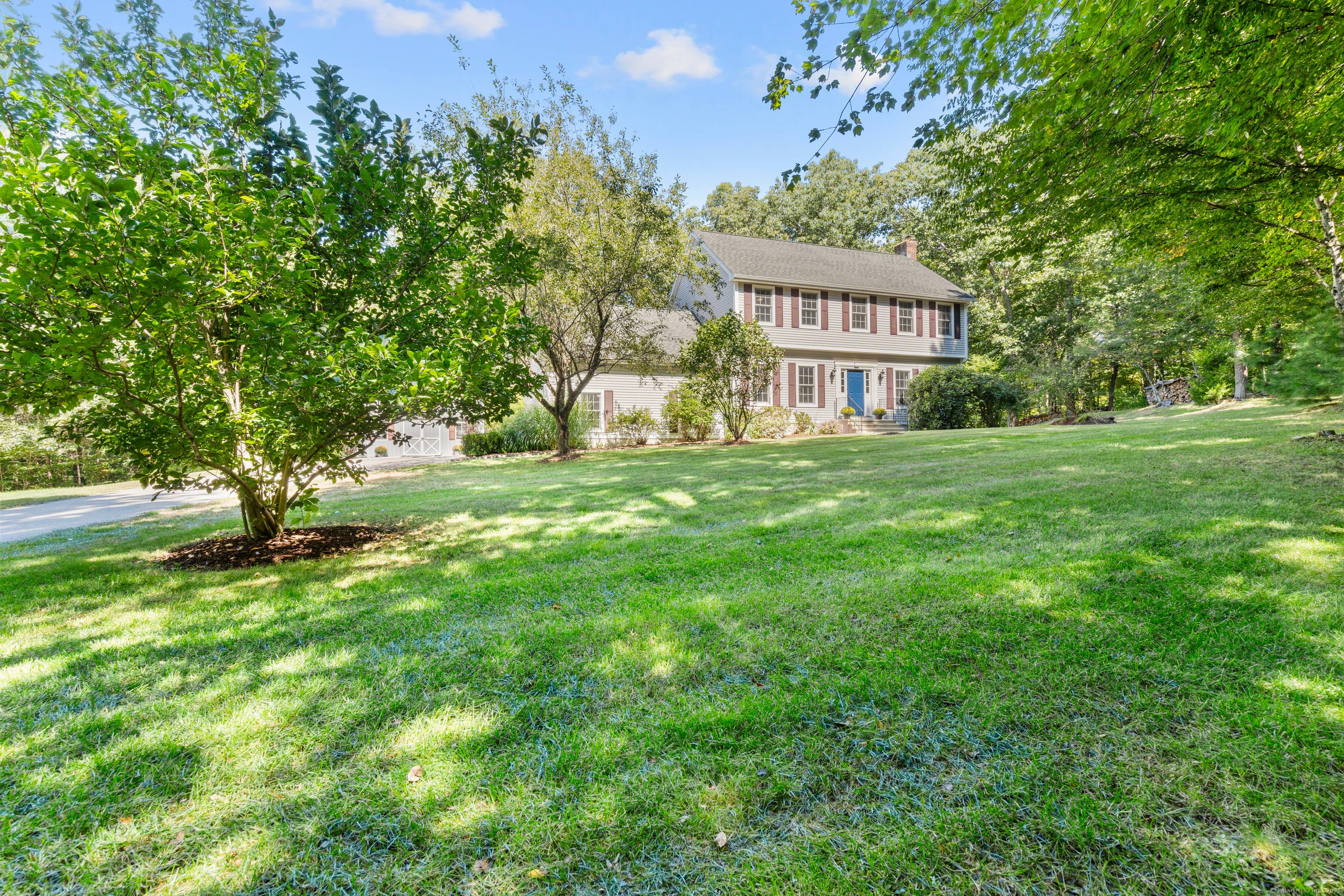 This inviting colonial blends timeless charm with thoughtful updates, offering a lifestyle perfect for both everyday living and entertaining.