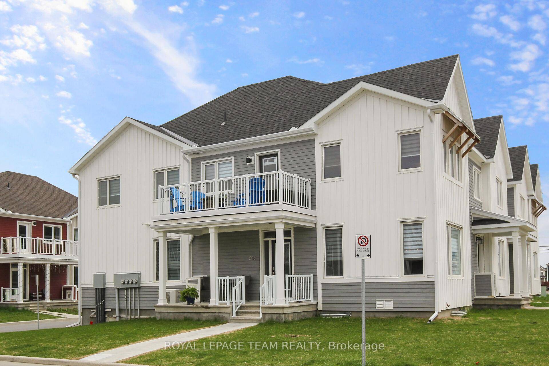 Enjoy this upgraded end unit corner lot property.