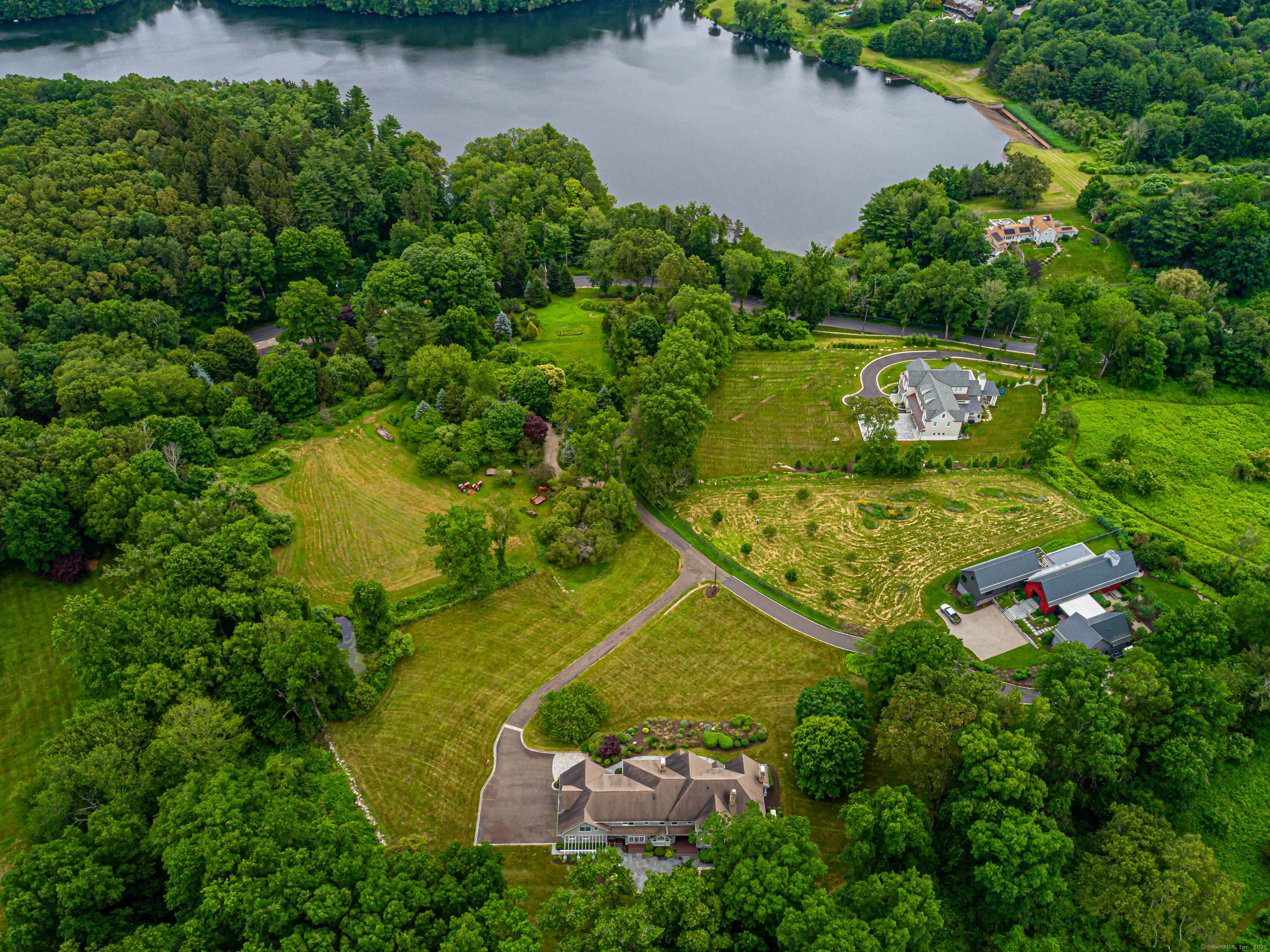 This stunning custom Colonial at 125 Nod Hill Road was crafted by renowned architect Rick Moisan.