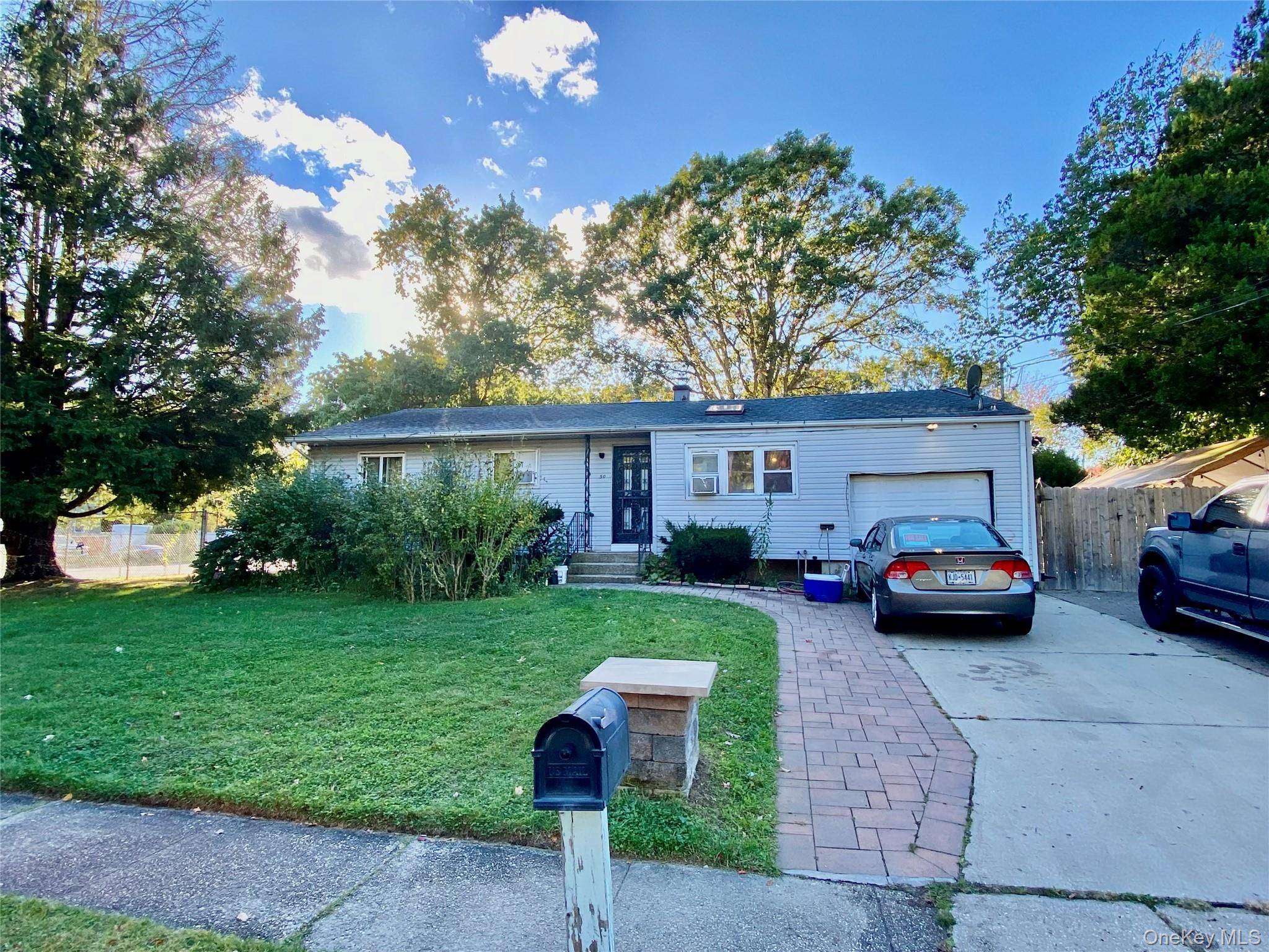 Welcome to 50 Montauk Ave, a charming home in the heart of Brentwood !