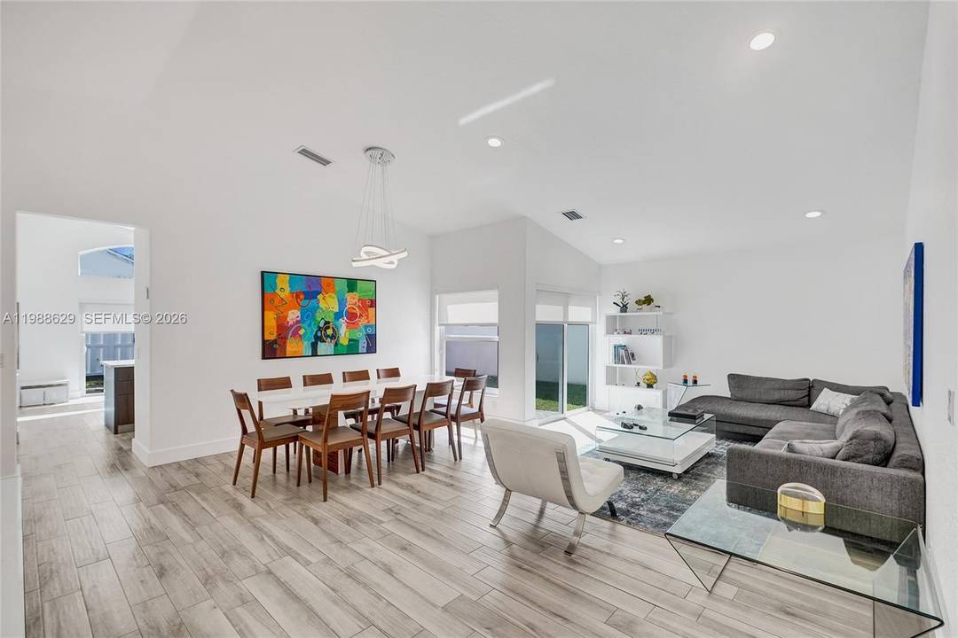 Welcome to 4928 SW 33rd Way, a beautifully maintained one story home in the gated community of Banyan Oakridge in Hollywood.