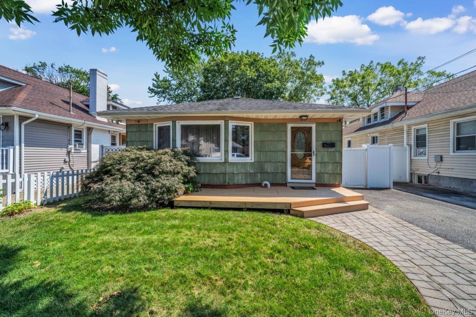 This charming ranch style home in Baldwin, NY offers three comfortable bedrooms and one full bath, perfect for family living.