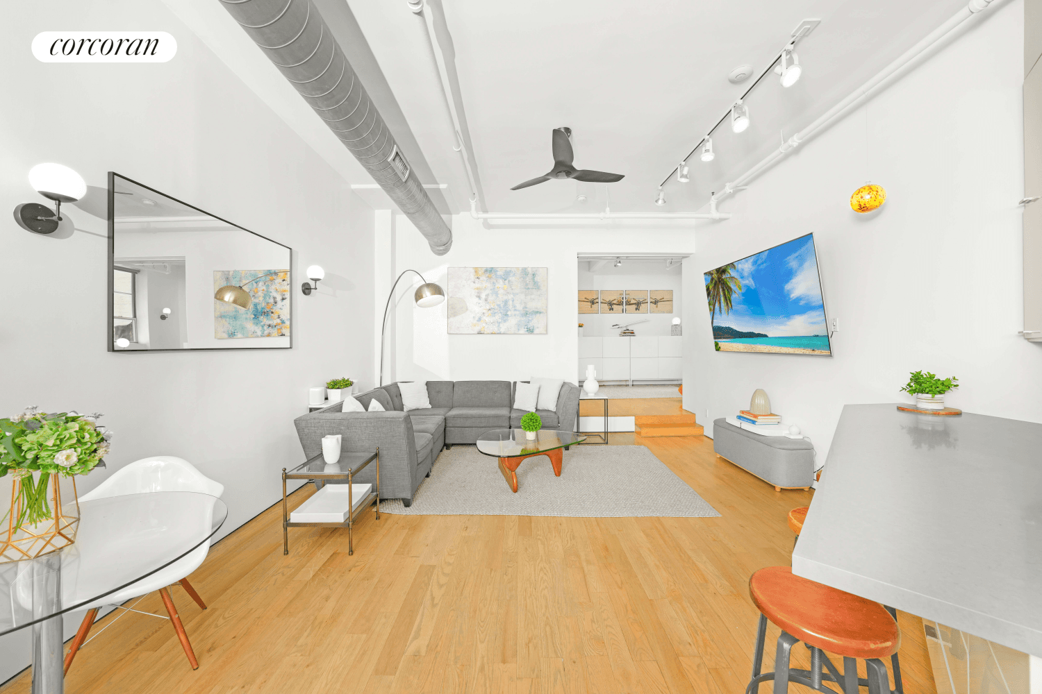 Welcome to an artistically curated residence in the iconic Toy Factory Lofts where industrial charm meets contemporary luxury.