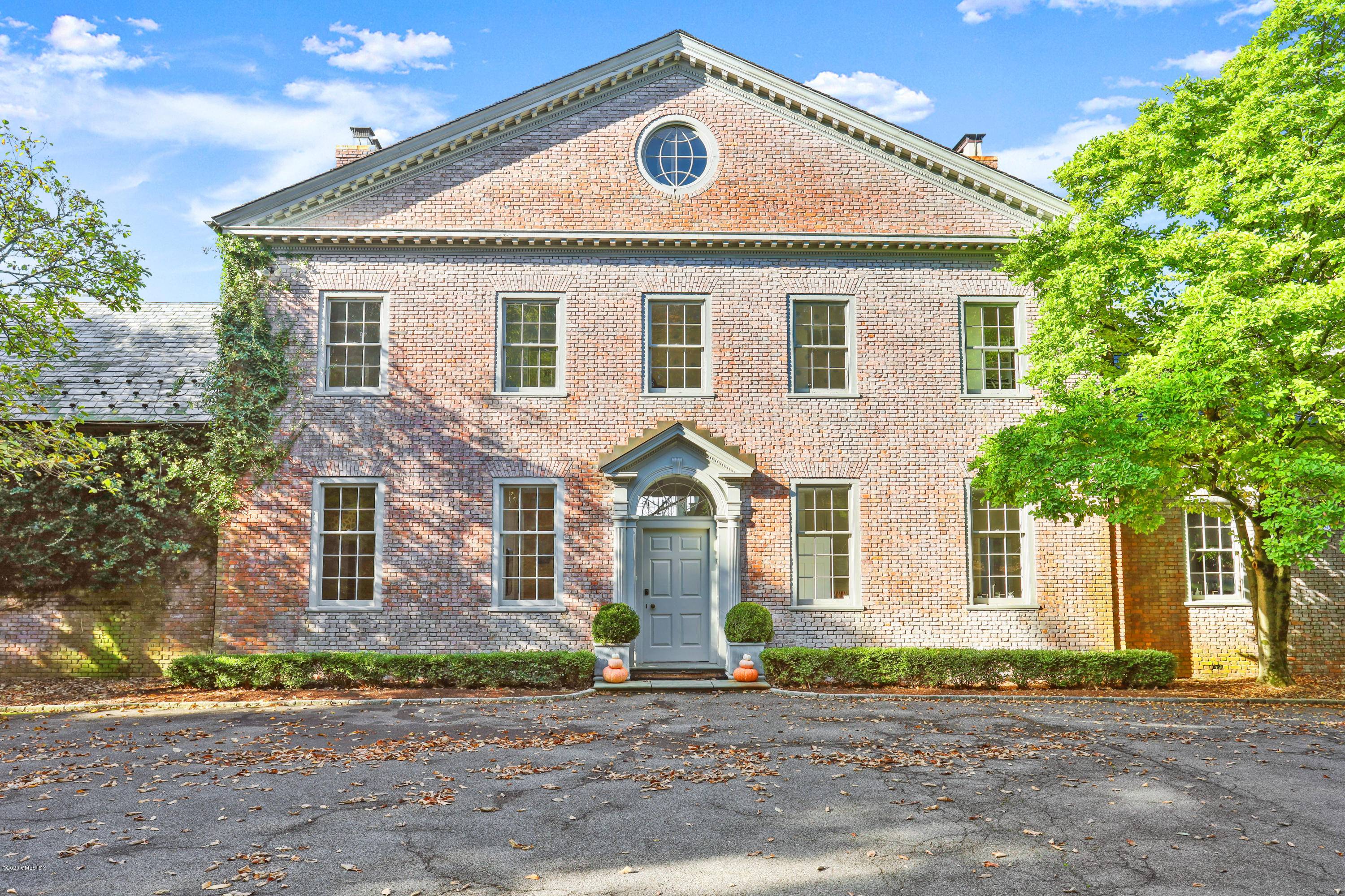This is 11 acres in Mid Country Greenwich on Round Hill Road, a rare find !