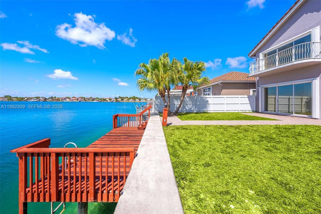 Enjoy a rare Miami lakefront lifestyle in the guard gated community of Three Lakes, one of the few Miami communities allowing motorboats up to 20 feet.