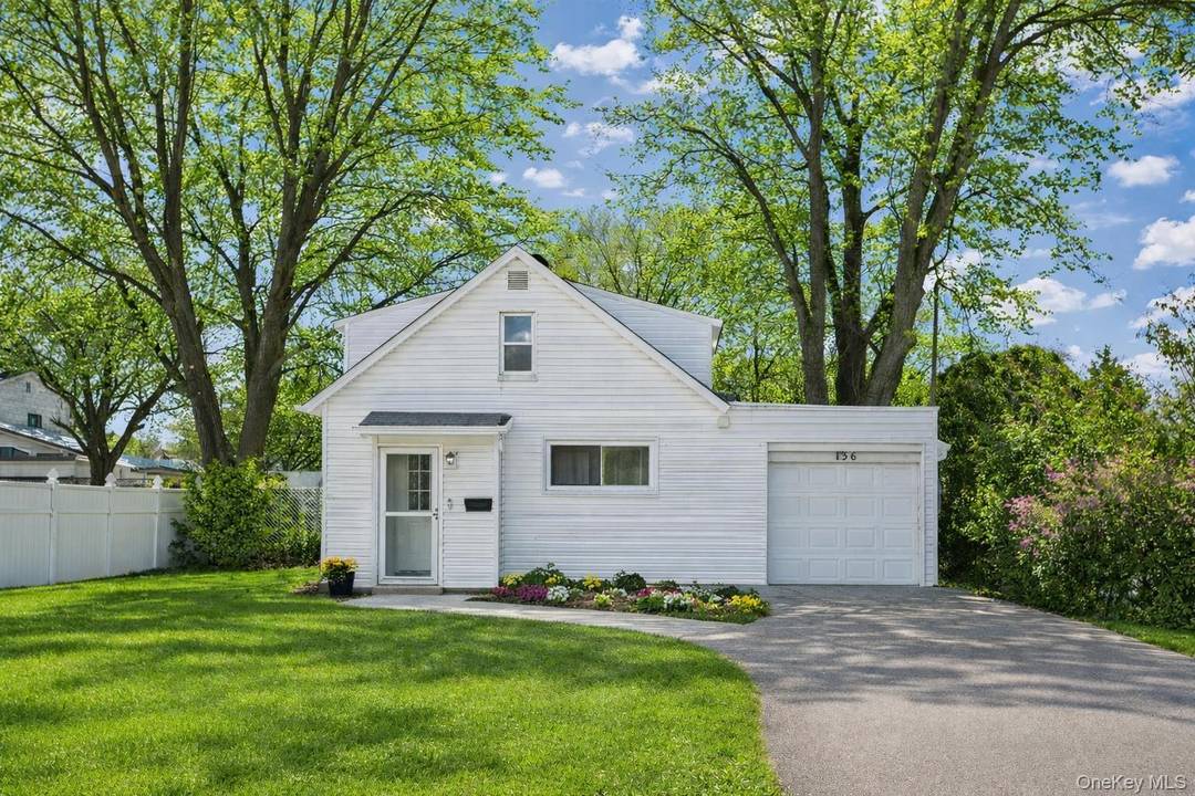 Introducing 136 N Delaware Ave Welcome to this charming, move in ready Cape in the heart of Lindenhurst Village.