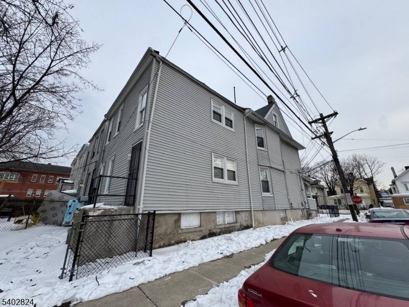 Recently Renovated Two Family Home Located near Park Avenue Elementary School near Garden State Parkway Orange Train Station Features Hardwood Floors, Granit Kitchen much more