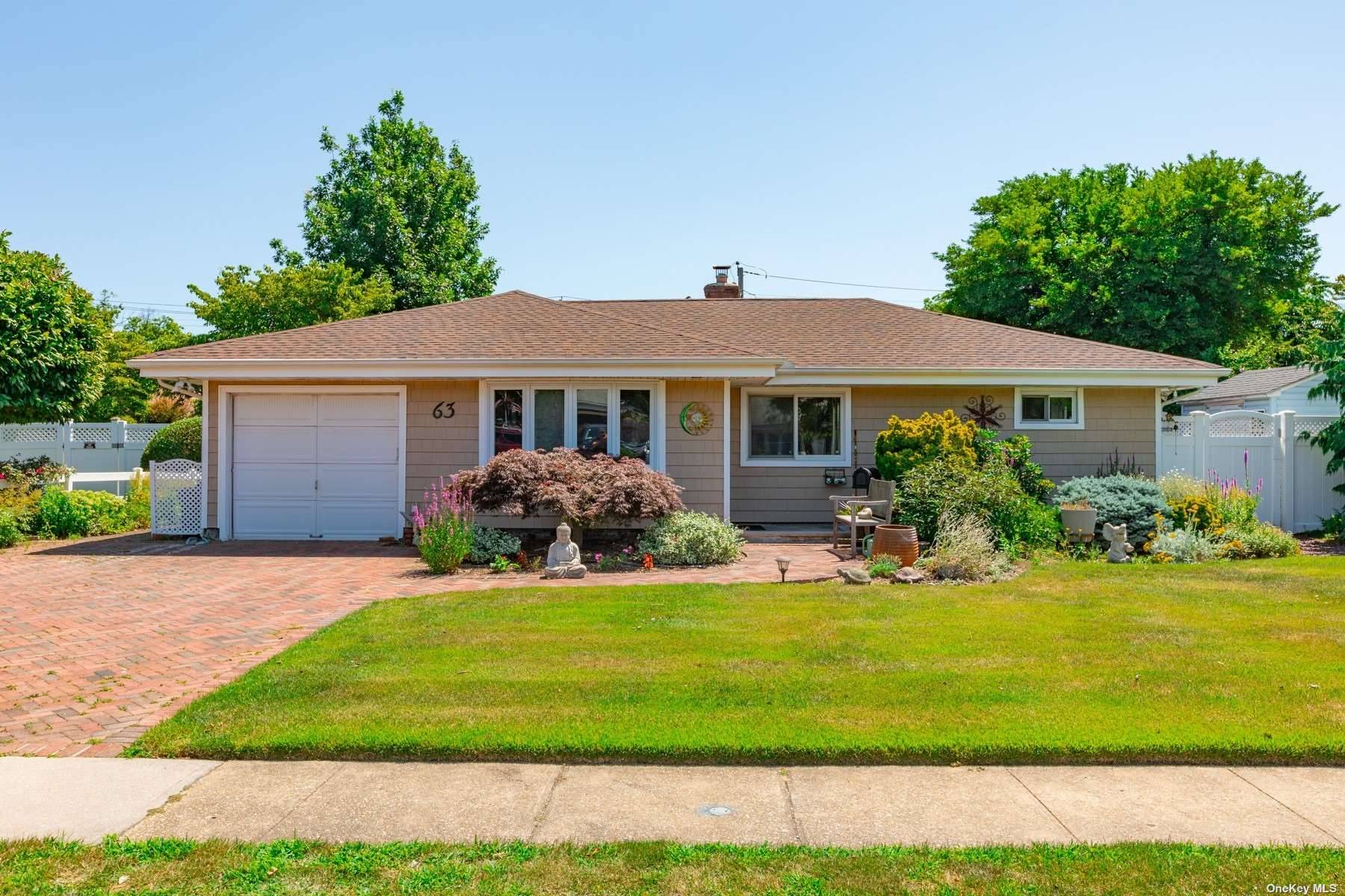 Welcome to this Charming Expanded 3 Bedroom, 2 Full Bath Expanded Ranch in Hicksville, Close to 2 Major Shopping Centers.