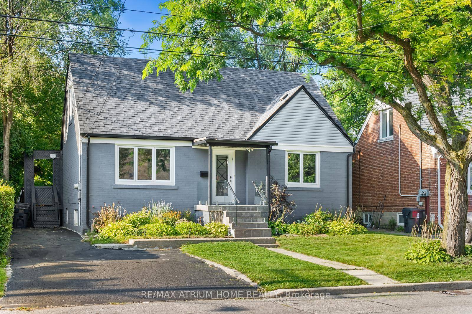 50 ft Lot Can Potentially Be Severed into 2 Amazing Investment Opportunity Subject to City Approval Stunning 3 1 bedroom home in the highly sought after Lansing community !